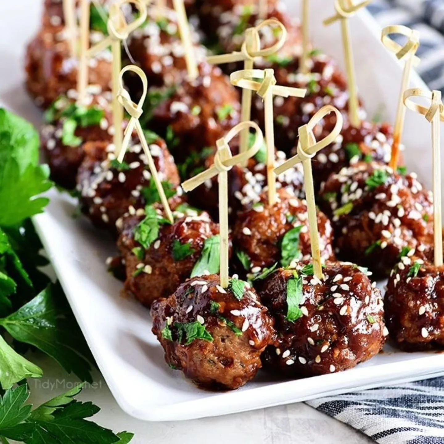 Glazed meatball canapés with cocktail sticks